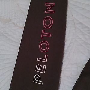 Peloton high waisted leggings. Dark  gray with a very subtle green undertone.